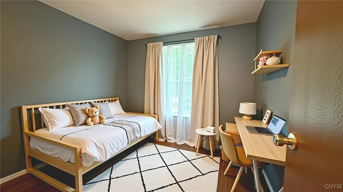 Virtually staged bedroom 3 - meant for illustrative purposes only. Actual room is unfurnished.