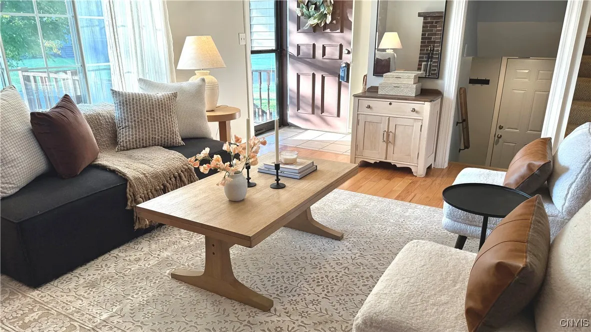 Door to the garage shown off of the staircase going down