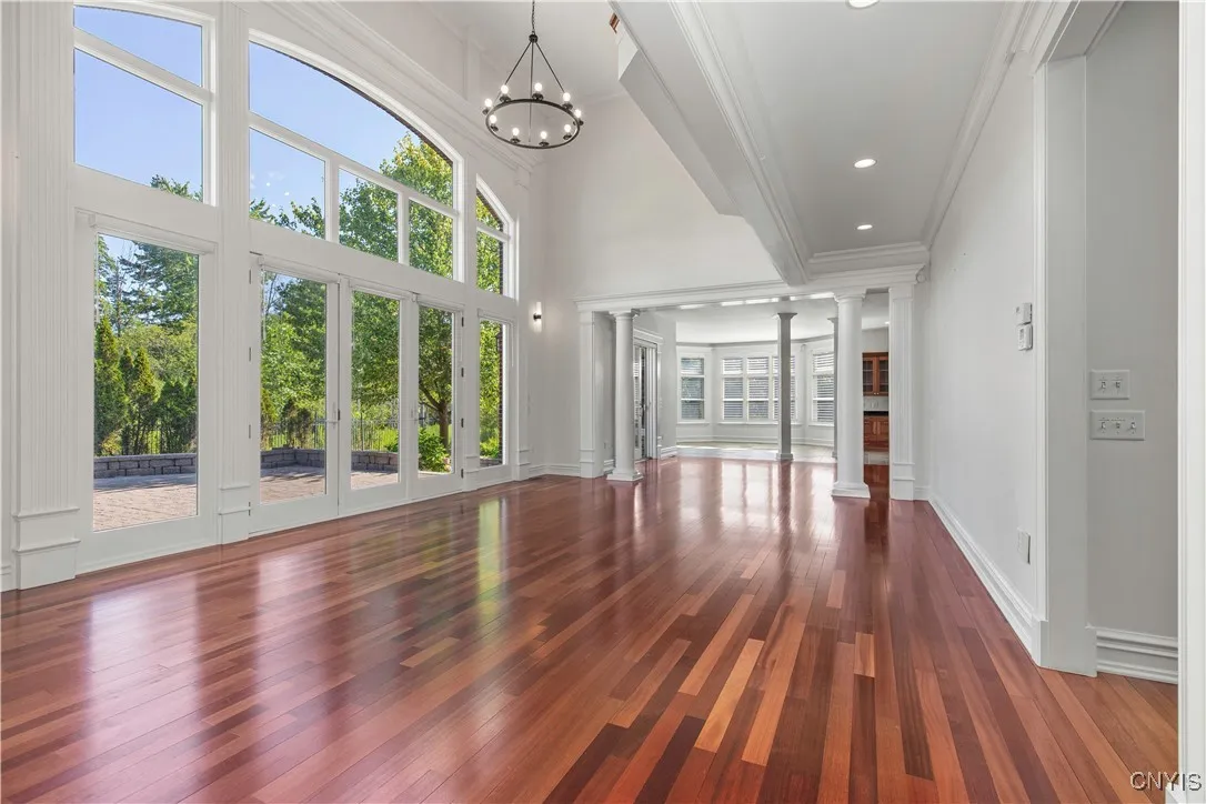 Family room with doors that lead to the paver side patio.