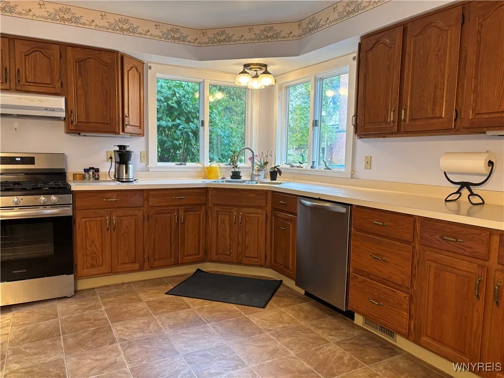 Corner sink overlooking front & side yard!
