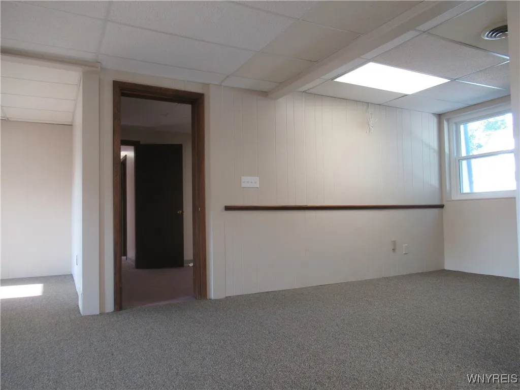 Door Leads to 3 or 4 More Office Spaces...Could be used for Safe Storage