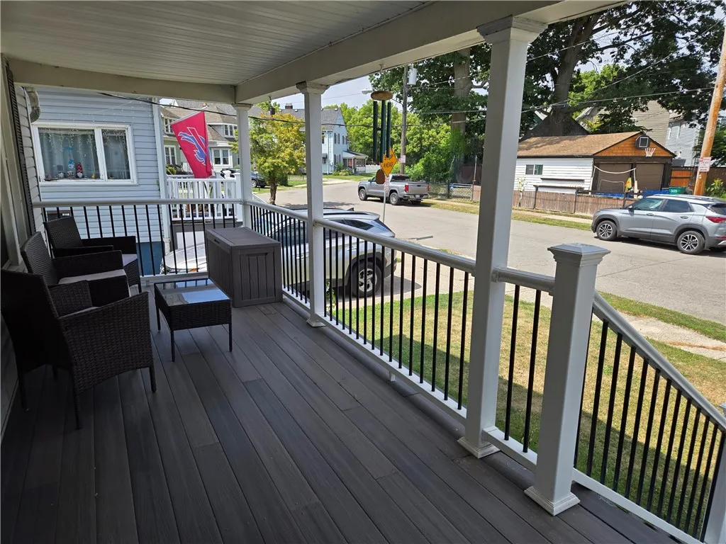 The open front porch is perfect for greeting friends and neighbors.