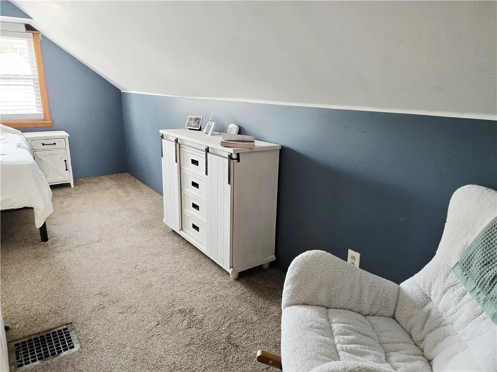 The knee walls are great for side pieces of furniture.