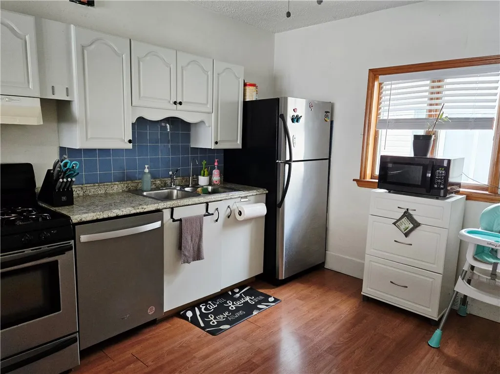 The kitchen has nice flow and workspace.
