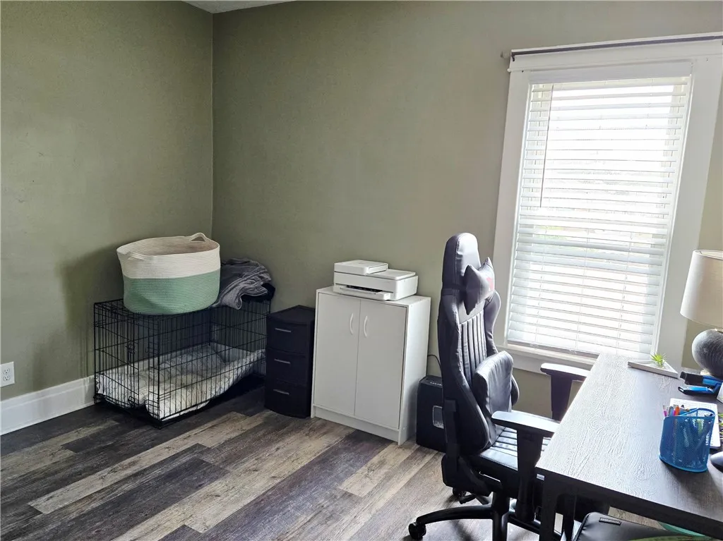 The smallest of four bedrooms, but it still has a formal closet.