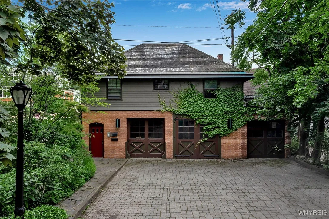 Carriage House with 3 units and 3 car garage