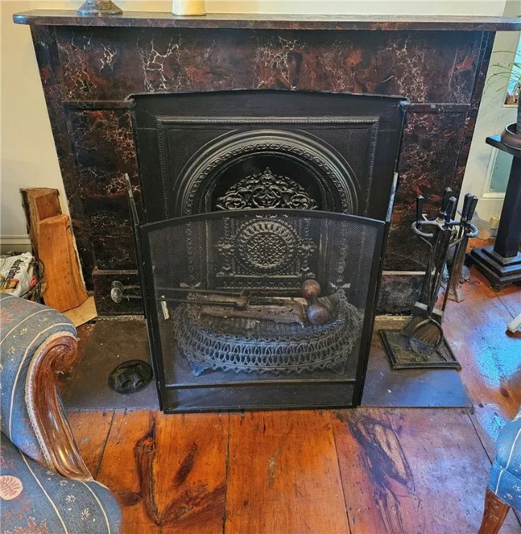 Wood burning fireplace, marble mantel and surround