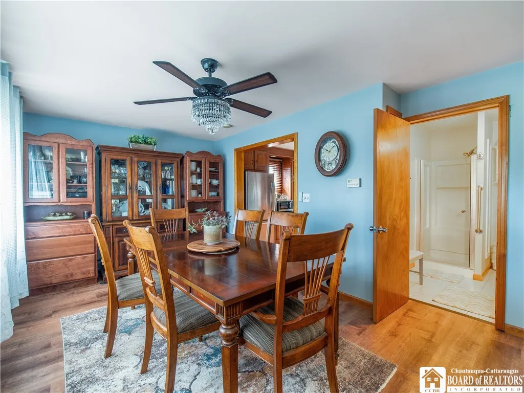 The cabinets on either side of the hutch do not stay but everything else does - including the window treatments and the rug