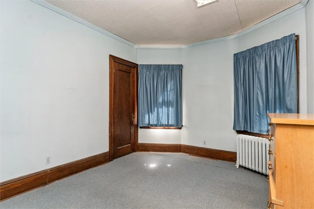 Unit2:  Bedroom #3 with carpet over hardwood floors