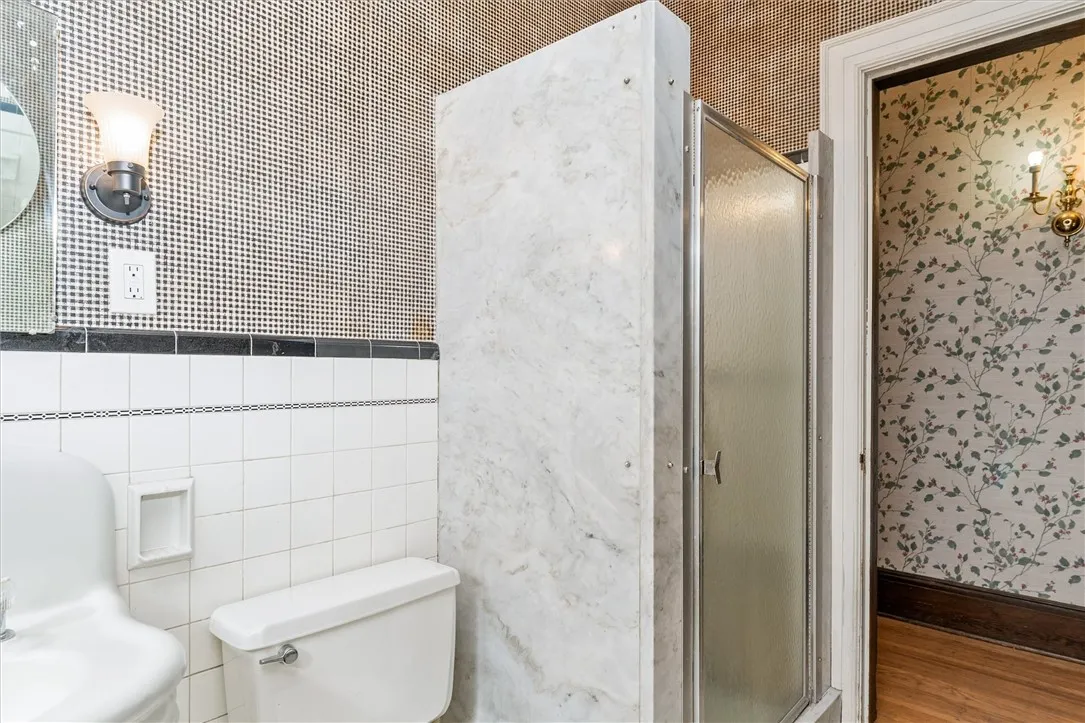 Marble shower in Full Bath