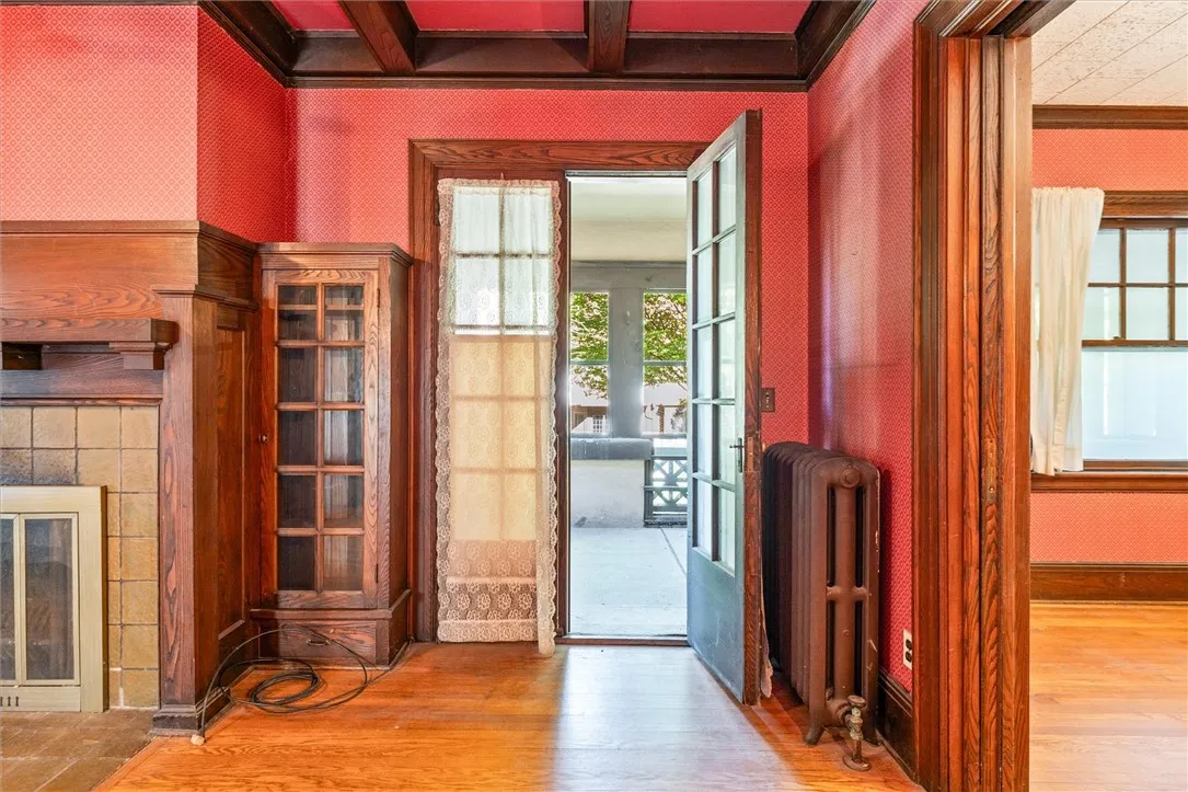 French doors lead to screened porch