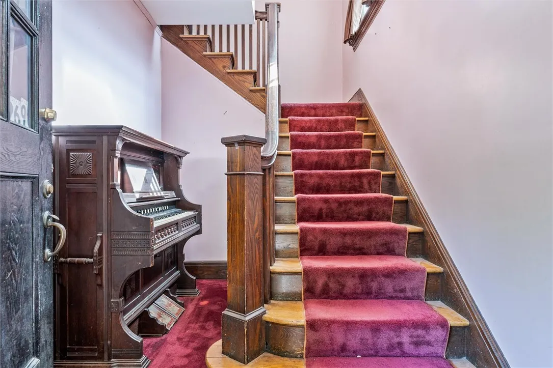 Beautiful staircase leading to 2nd floor