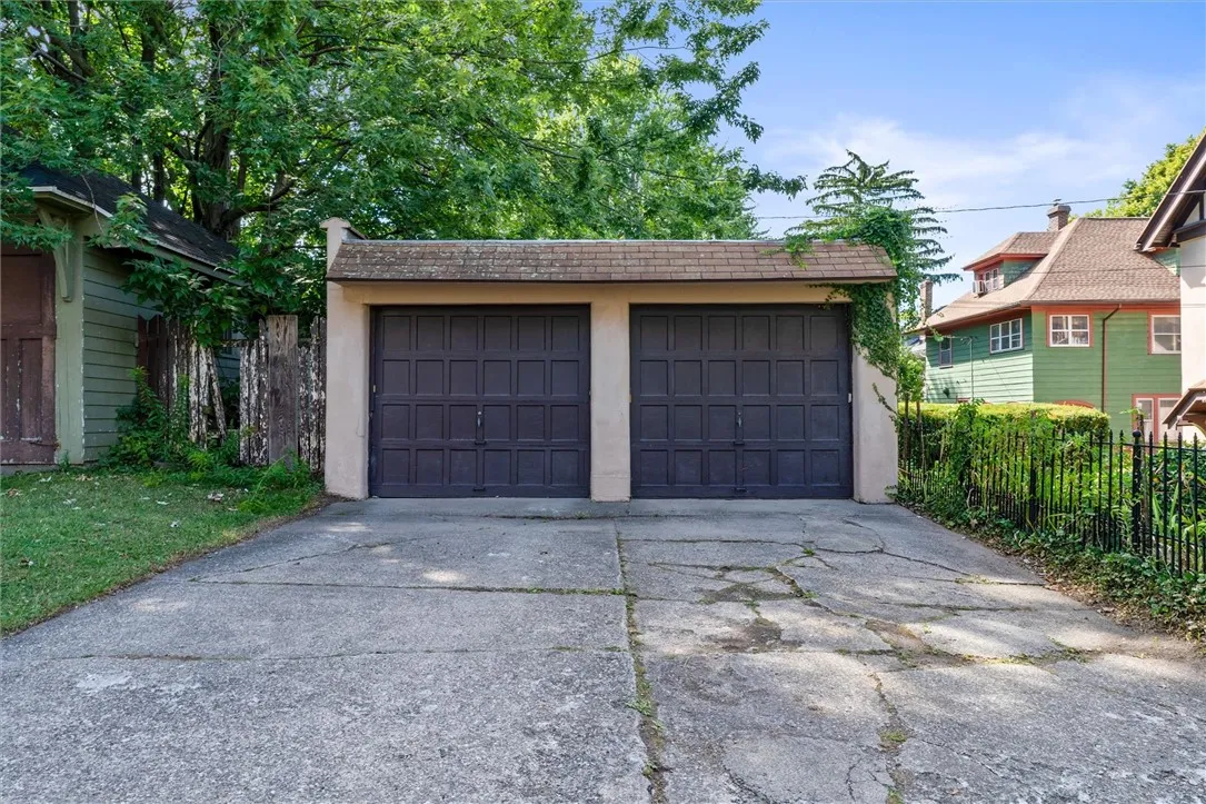 2 car detached concrete block garage with garage door opener
