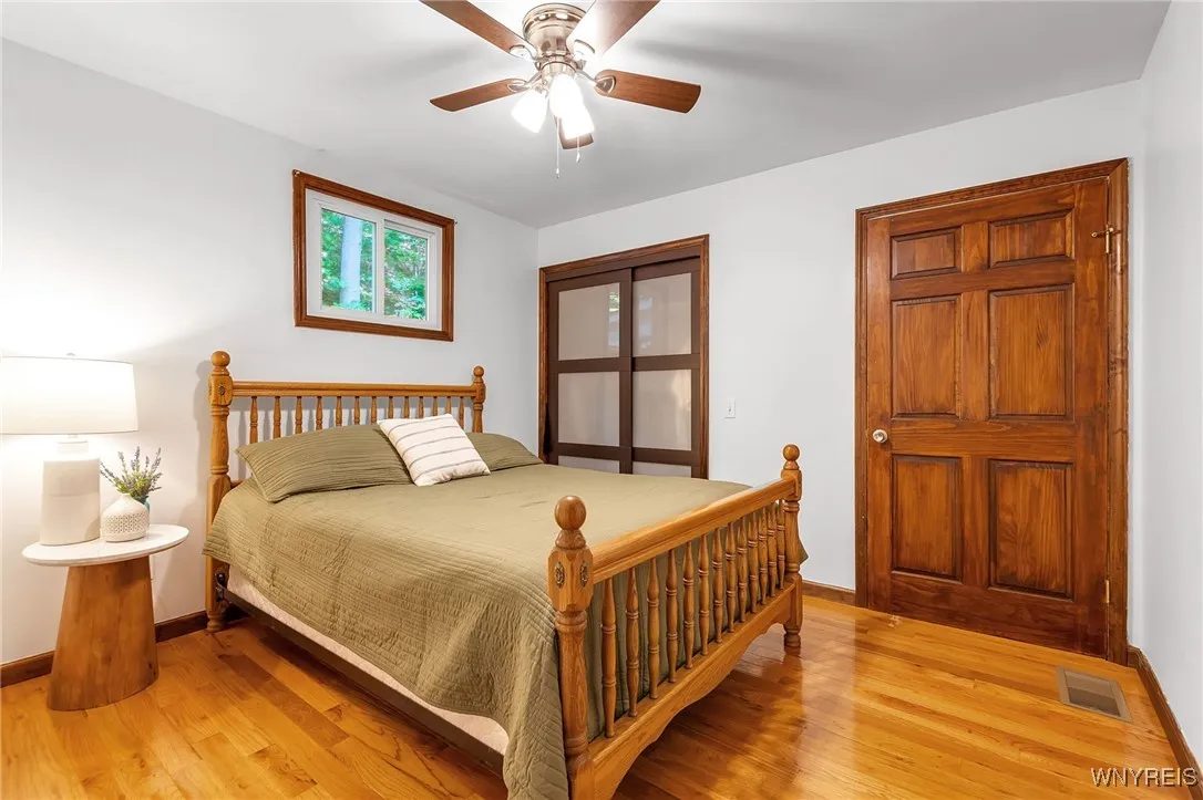 Bedroom 1 with hardwood floors