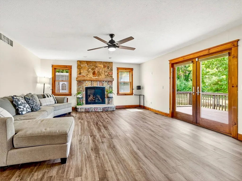 Great room with laminate floors and gas fireplace