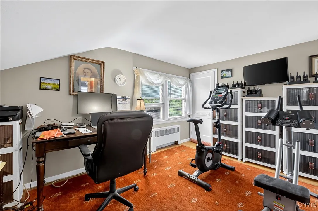 Bedroom with door to walk in attic
