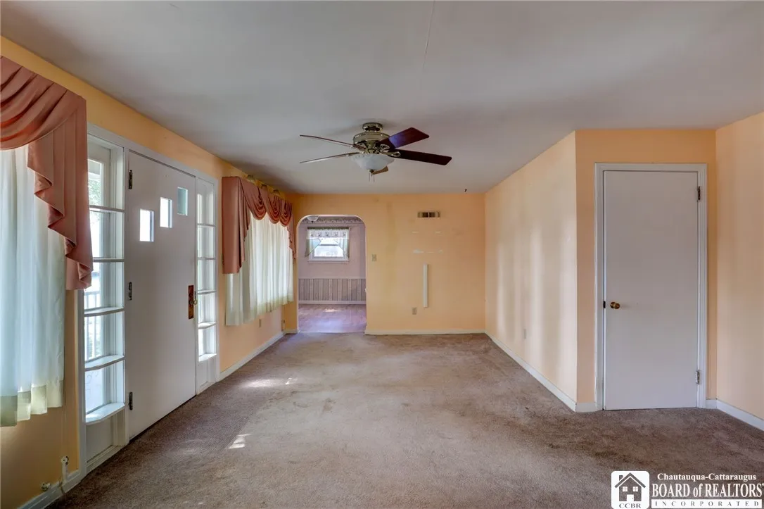 Living room toward the dining room...door to the second floor