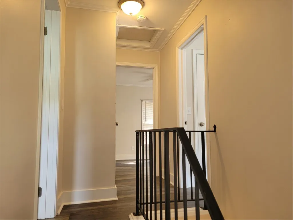 stairs leading up to the bedrooms and bath