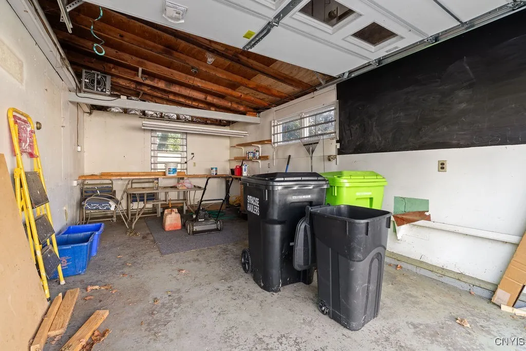 2 Car Garage, 2nd Bay used for storage and Workshop, Heated.