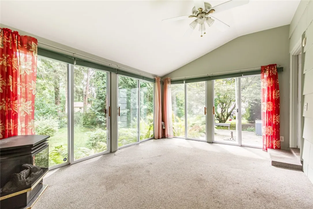 fabulous sunroom with wood stove