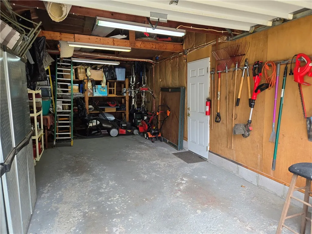 storage and workshop space inside the garage.