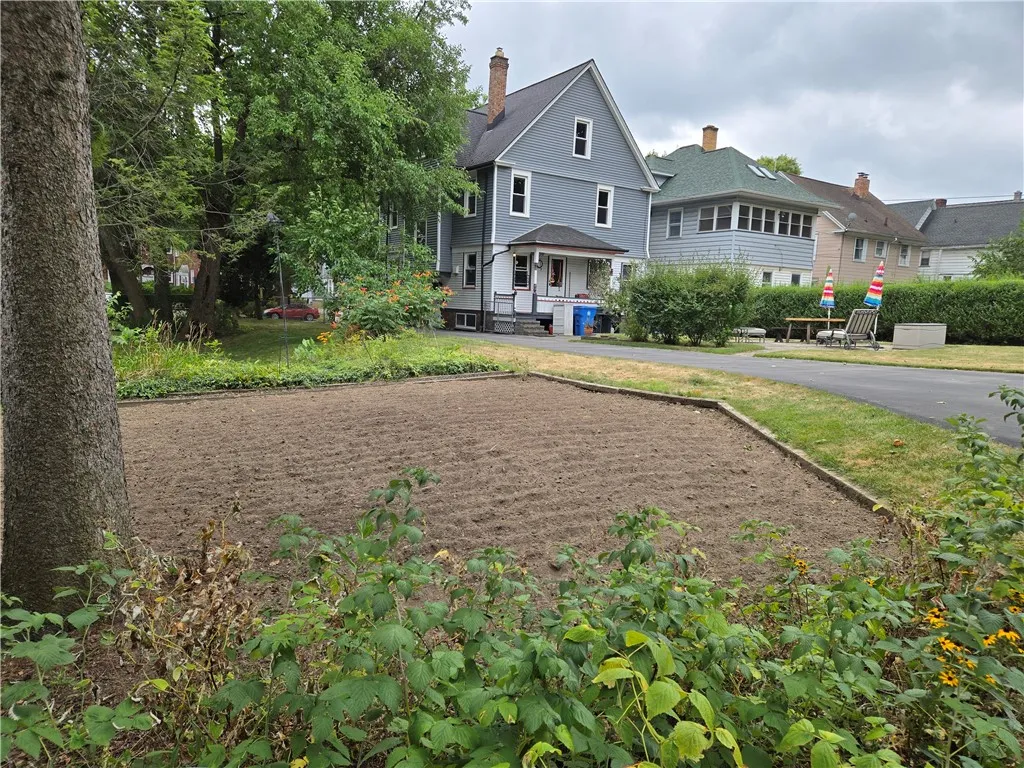 Don't miss the tilled garden (framed with raspberries).