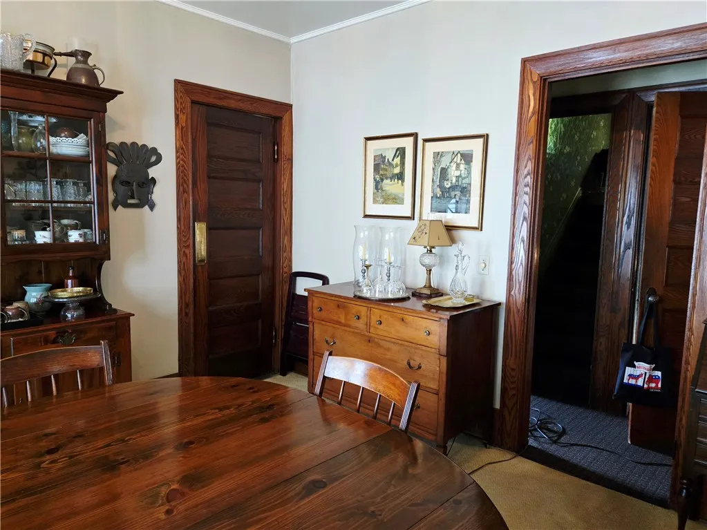The dining room also connects to the living room and the kitchen.