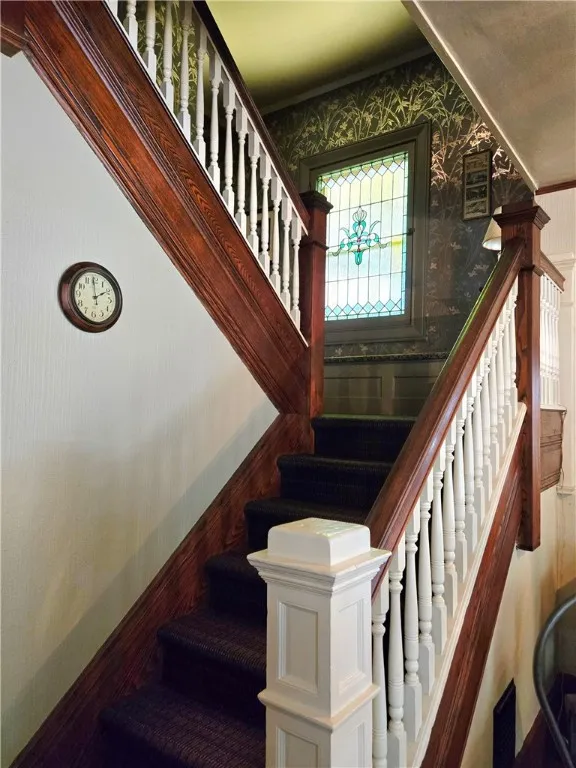 There are two sets of stairs to the first landing.