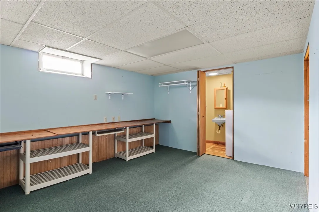 basement office craft room with half bath