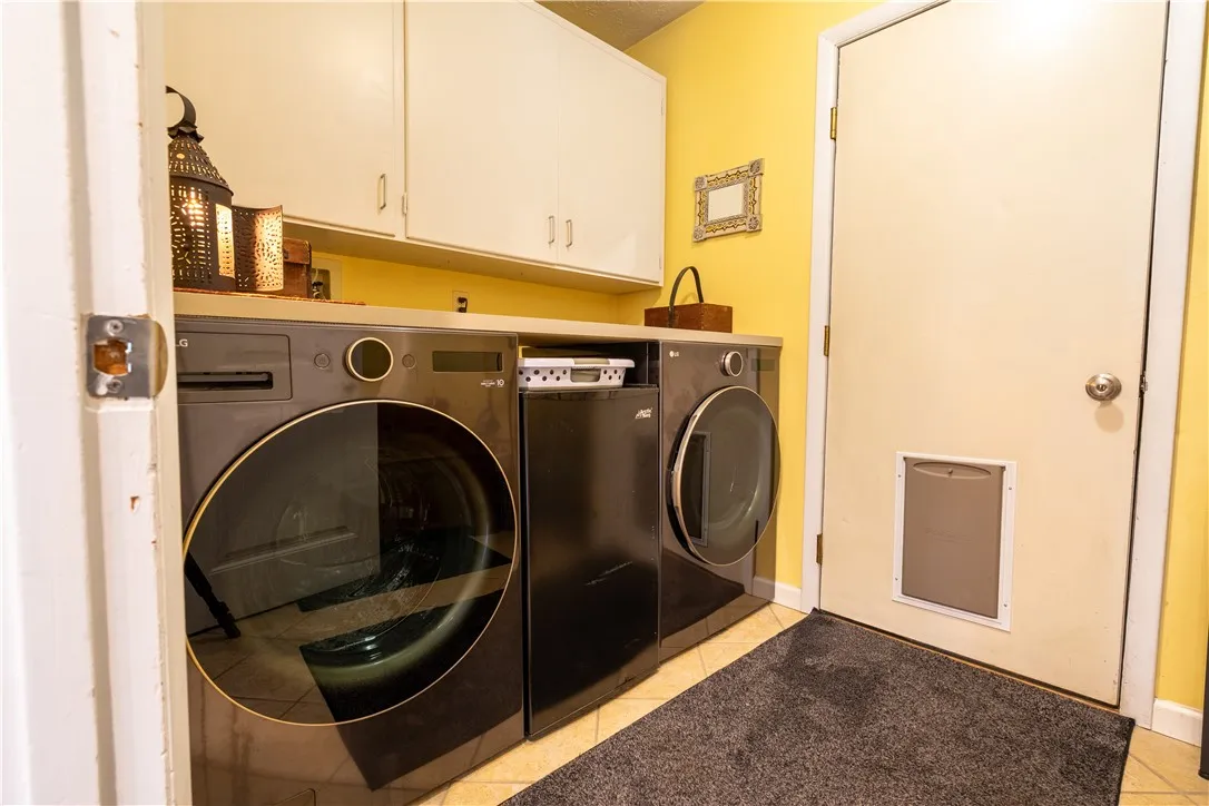 Laundry area sits between garage and kitchen