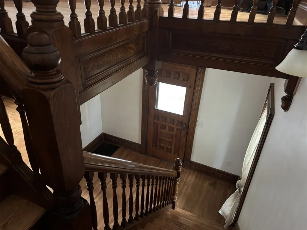 Looking down from main stairway to front door