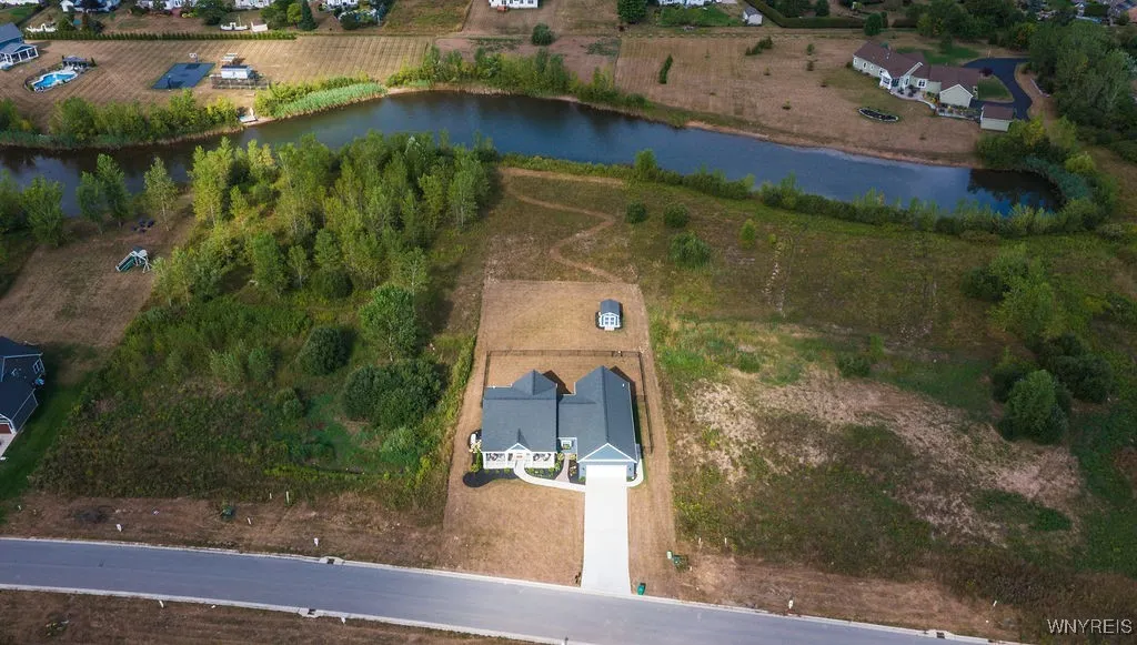 1.1 acre property goes to the pond in the back