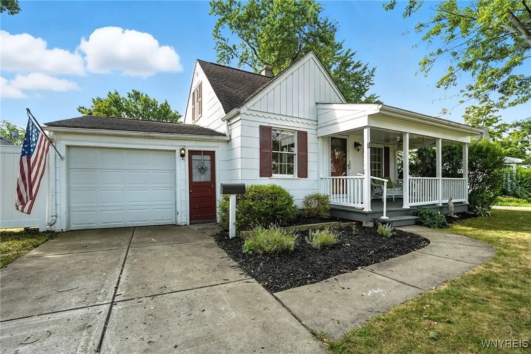 Concrete driveway & attached garage