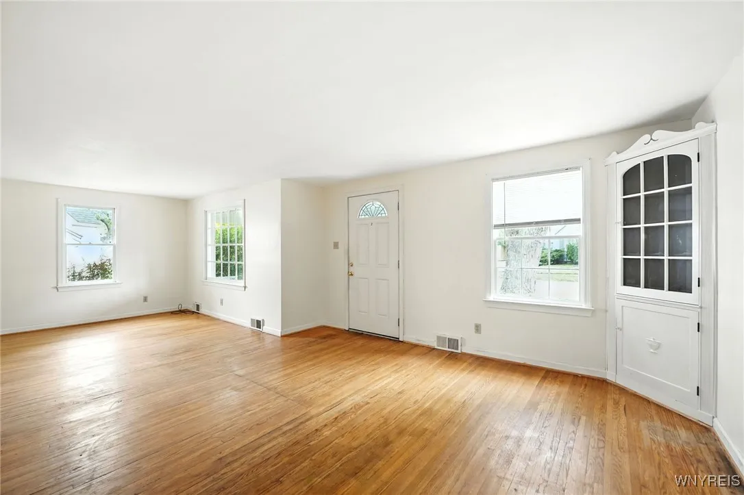 Step inside to a comfortable living & dining area  - hardwoods throughout