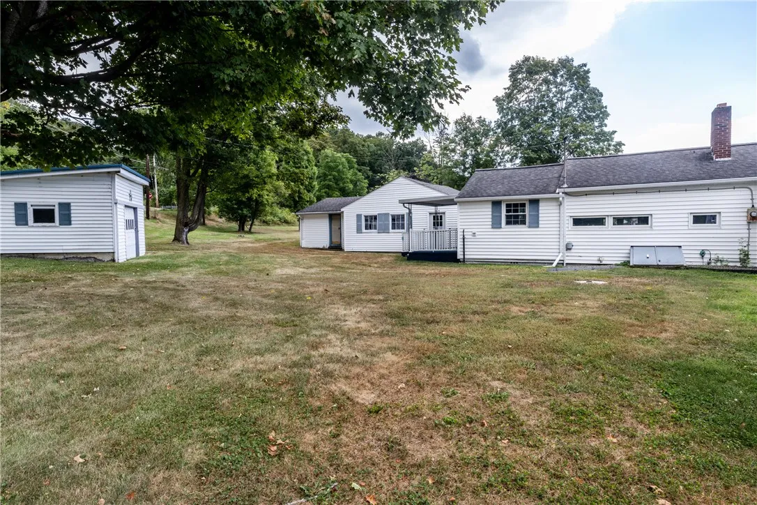 House comes with a 2 car detached garage and a 3rd garage/shed for added outdoor storage 
