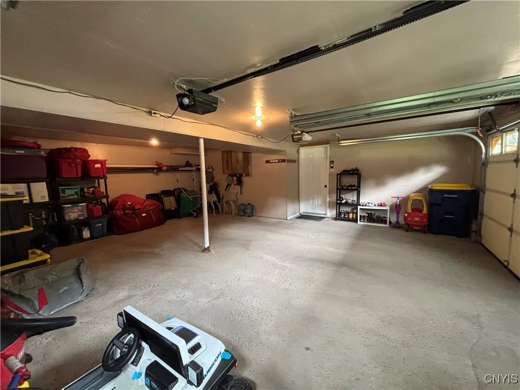 Two garage door openers in garage