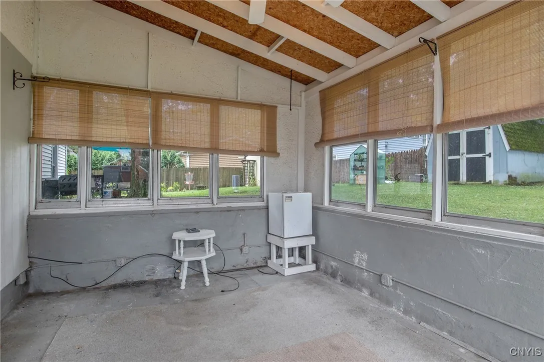 Sunken three season room off of the kitchen with electric