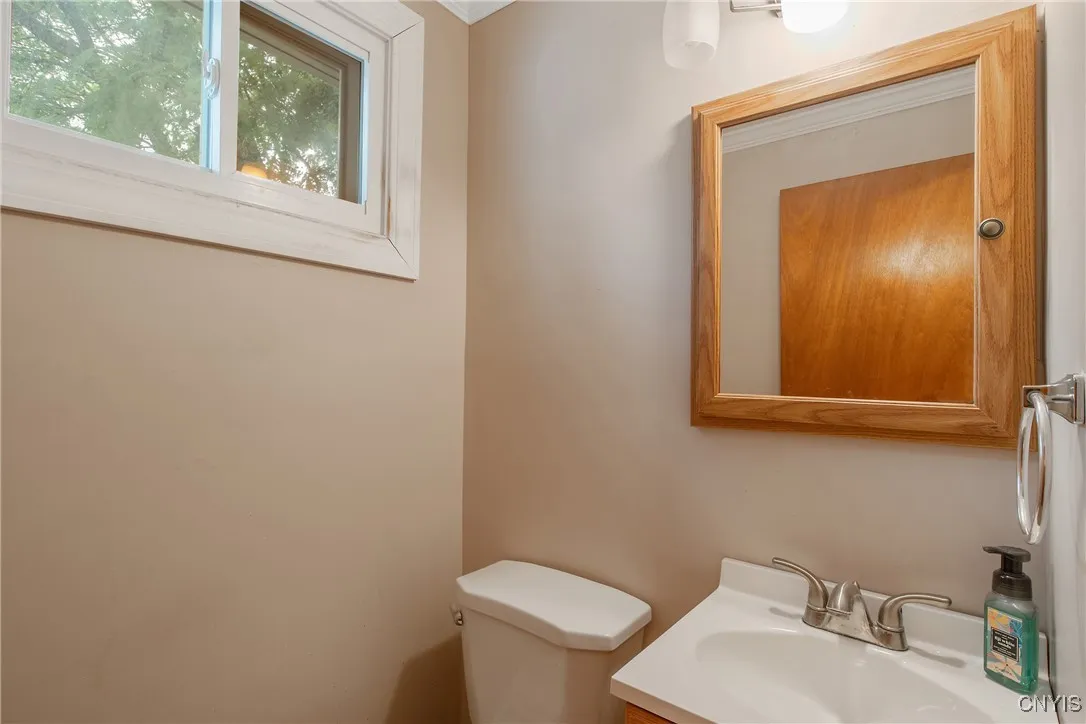 Half bath located in the primary bedroom.