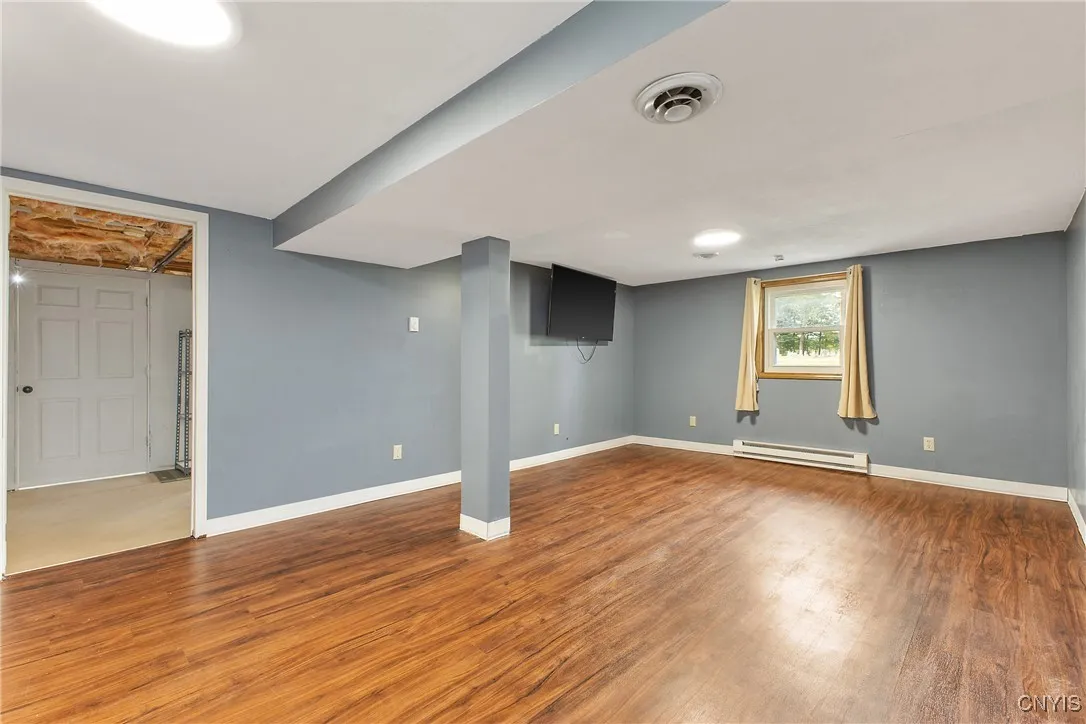  Newer, laminate flooring in the primary  bedroom.