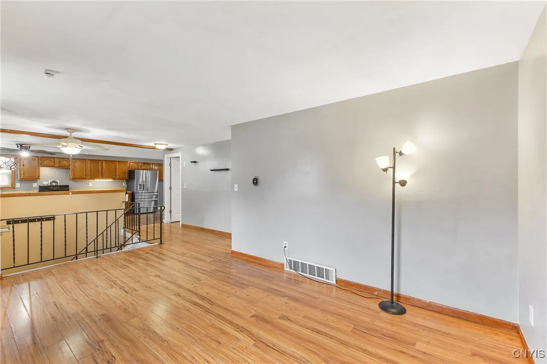    The living room is open to the kitchen.