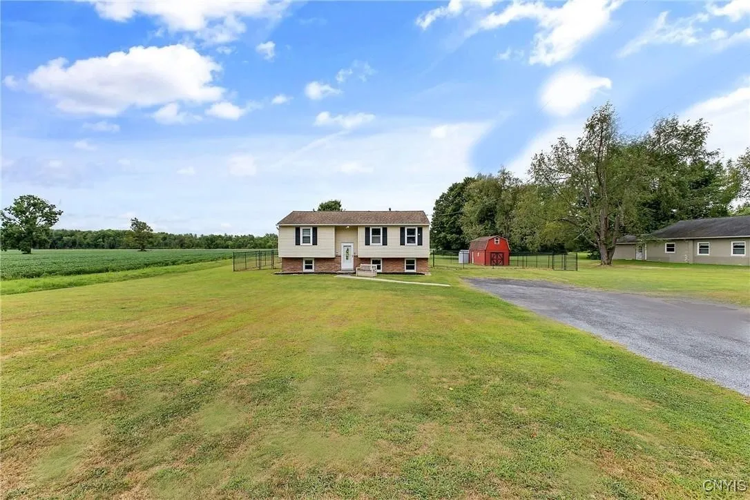   Home sits on 1 acre with a fully fenced, 6 ft high, vinyl fence.