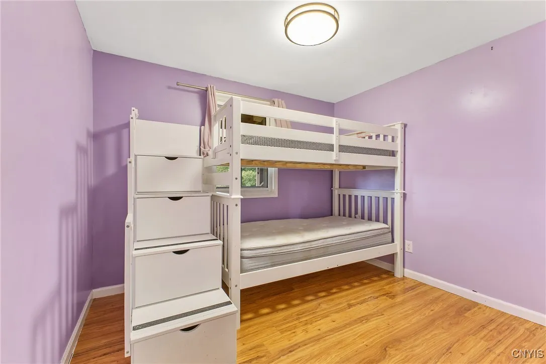 Bedroom #1   Bunk bed is for sale !!  Unique stairs to the upper
  bunk, have storage !!