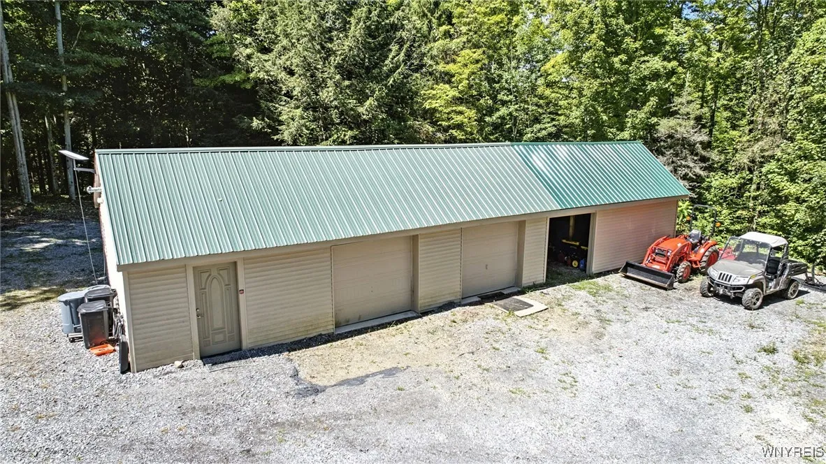 Detached garage and drive through pole barn
