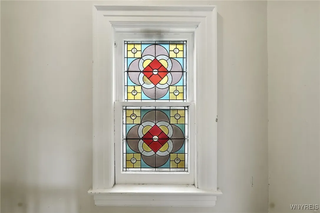 2nd floor stained glass window on front staircase