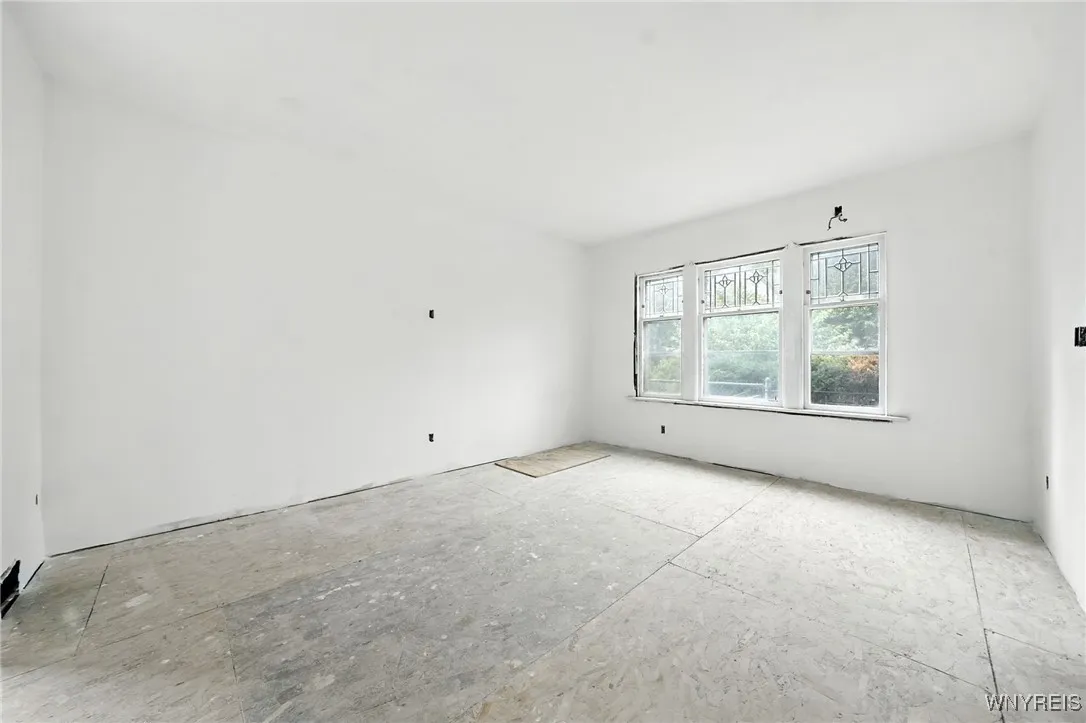 1st floor living room with leaded glass front windows