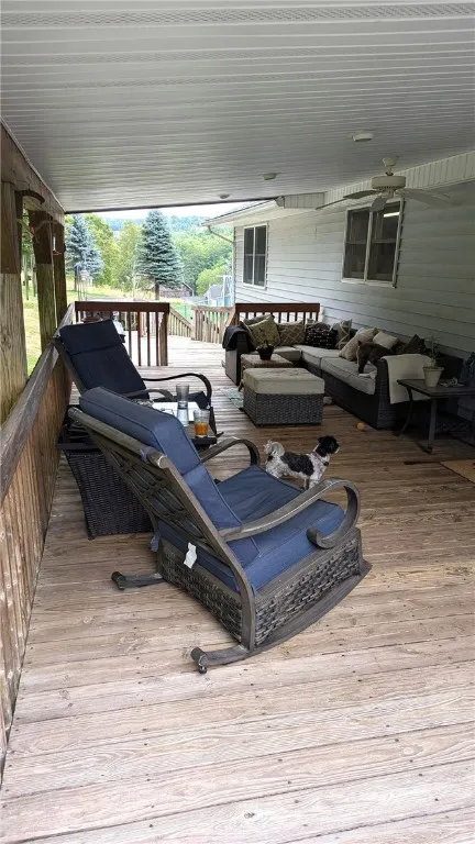 Covered deck leads to sliders entering home or open deck and that great pool