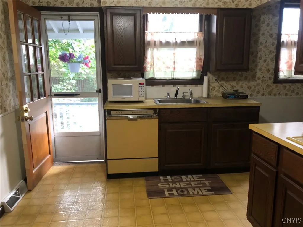 Exit from the Kitchen to Porch & back yard