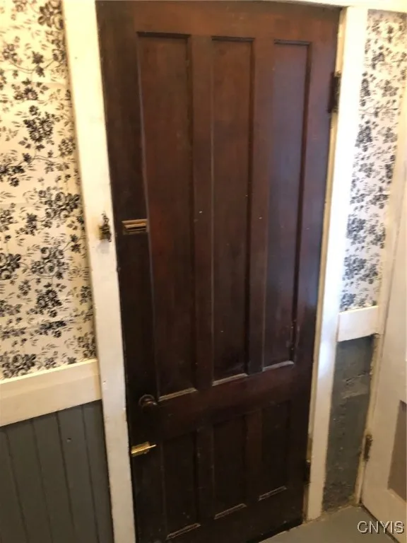 Door off back hall to the attached Garage
