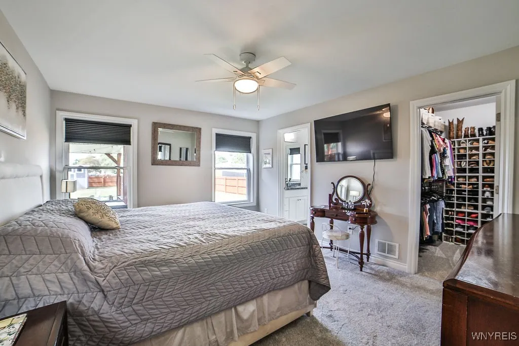 Primary suite with full bath and walk-in closet