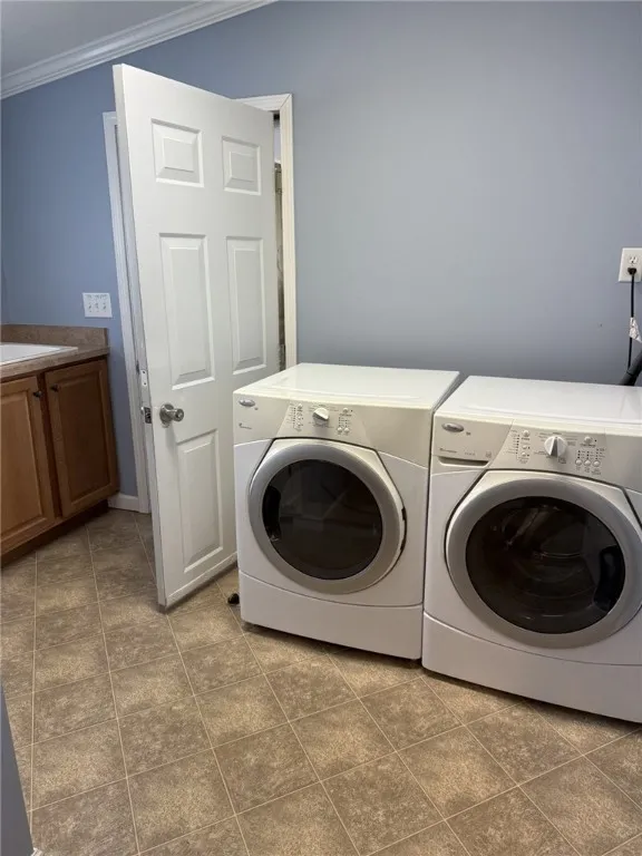 Laundry w/Sink, door to Garage
